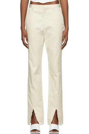 DION LEE Pantalon blanc cassé effiloché à revers fendus