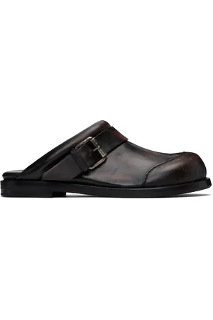 Acne Studios Mules brun et noir en cuir à boucle