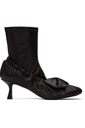Acne Studios Bottines brunes en cuir à boucle décorative