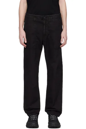 Stone Island Pantalon noir en canevas brossé de coton bio à effet vieilli emblématique