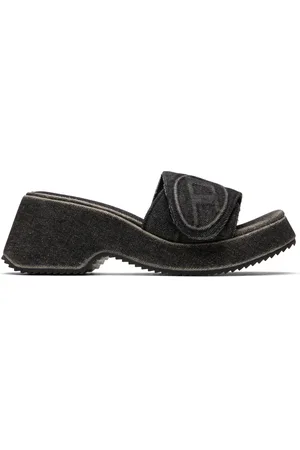 Diesel Sandales à talon noires à logo ovale et à plateforme
