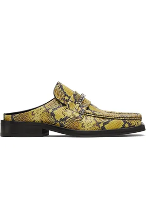 MARTINE ROSE Mules jaune et noir à bout carré