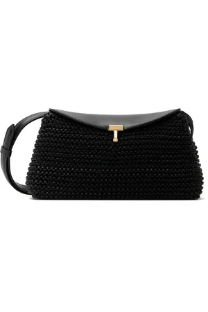 Totême Pochette noire en cuir tissé à verrou tournant