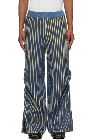 Stanley Pantalon bleu marine et jaune en tricot côtelé à nervures