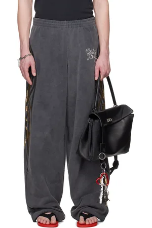 Balenciaga Pantalon de survêtement ample gris à images Tacky Gold