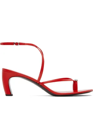 Tory Burch Sandales à talon rouges à brides entrecroisées et à ferrure de style perçage