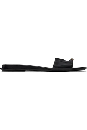 Tory Burch Sandales noires à ferrure de style perçage