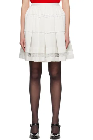 Shushu/Tong Minijupe blanc cassé à plis et à garnitures en dentelle