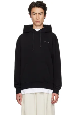 Jacquemus Pull à capuche noir à logo brodé - Le papier