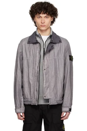 Stone Island Blouson teint en plongée bleu en canevas brut de lin enduit