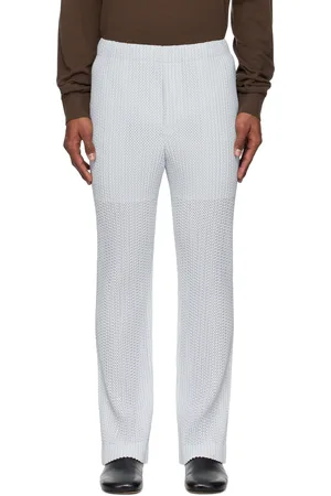 Issey Miyake Pantalon gris à perforations