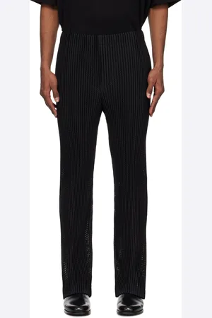 Issey Miyake Pantalon noir à perforations