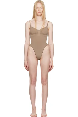 SKIMS Justaucorps taupe à entrejambe de style tanga - Seamless Sculpt