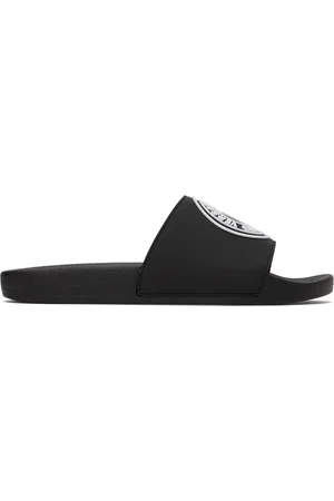 VERSACE Sandales à enfiler noires à logo circulaire