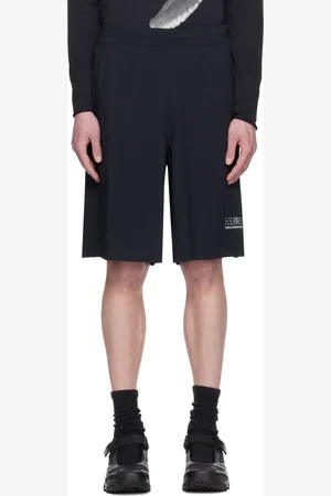 Maison Margiela Short de course noir édition Salomon