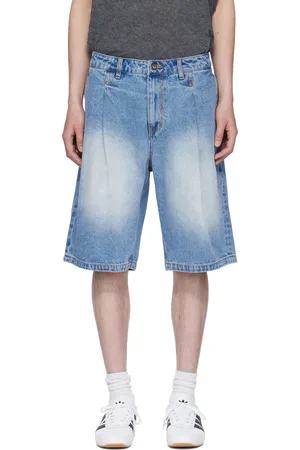 DIME Short bleu en denim à plis