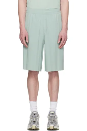 Maison Margiela Short de course bleu édition Salomon