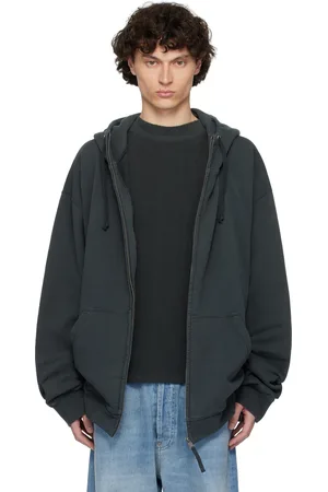 Maison Margiela Pull à capuche noir en jersey bouclette