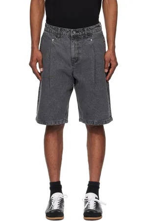DIME Short noir en denim à plis