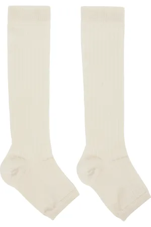Swedish Stockings Chaussettes sans bout hauteur mollet blanc cassé exclusives à SSENSE