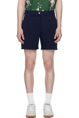 Lacoste Short de tennis bleu marine à passepoils