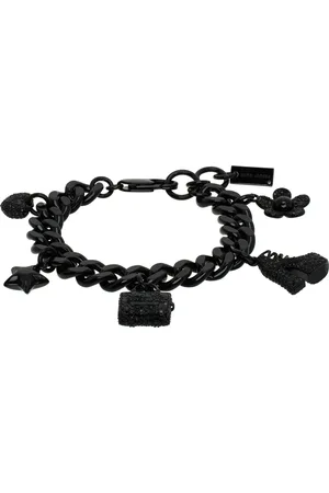 Marc Jacobs Bracelet à breloques emblématiques à pierres en verre serties en pavé