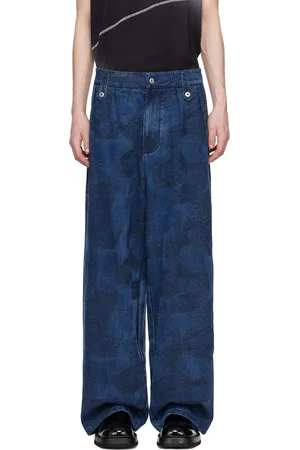 Feng Chen Wang Pantalon bleu en denim à motif graphique