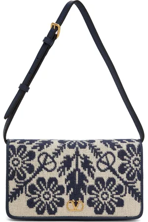 VALENTINO GARAVANI Sac beige et bleu marine à motif fleuri en jacquard et à logo en V
