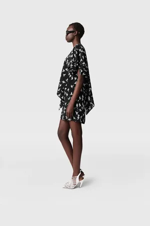 Stella McCartney Mini robe a manches courtes superposees avec imprime colombe, Femme