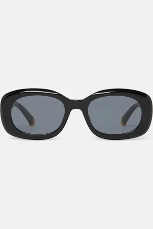 Stella McCartney Lunettes de soleil ovales epaisses, Femme