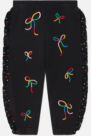Stella McCartney Pantalon de jogging a franges avec imprime rubans, Femme