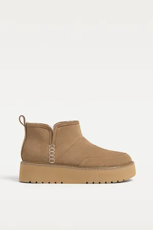 Stradivarius Bottines en fausse fourrure et cuir 35