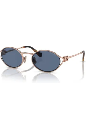 Miu Miu Femme MU 52YS ZVF1V1 Lunettes de soleil Métal Bleu Ronde Normale